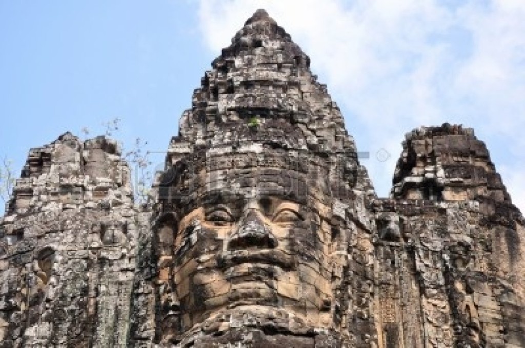 Ruins of giant smiling buddha statue at Angkor