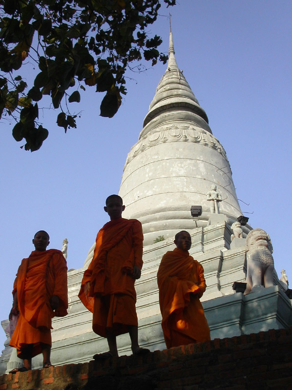 Monks in stupa of Wat Phnom, Phnom-Penh, Cambodia