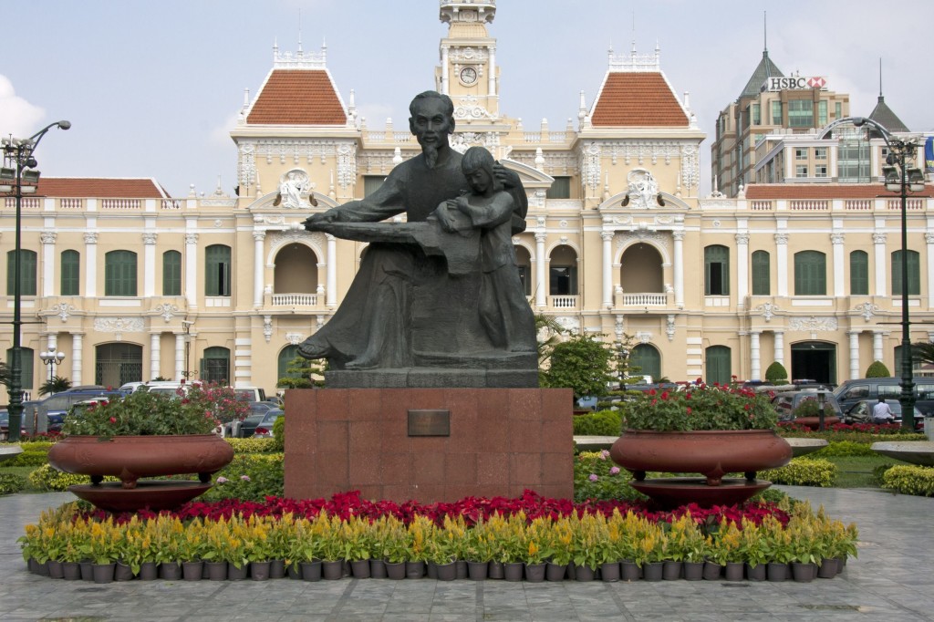 Statue of Ho Chi Minh and Peoples Committee Building in Ho Chi Minh city, Vietnam