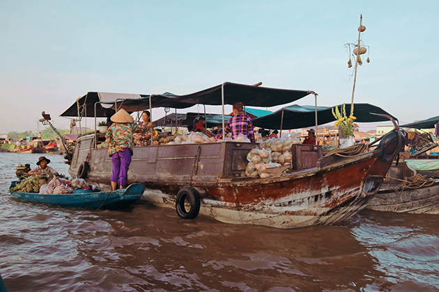 cai be floating market in 15 day vietnam family adventure tour