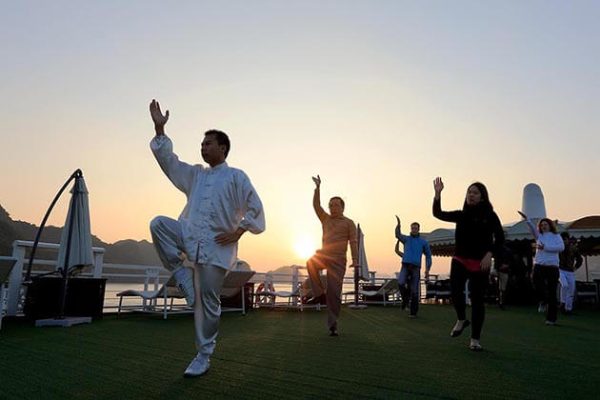 tai chi lesson at halong bay in the moring
