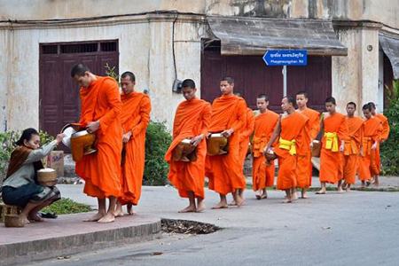 Alms giving ceremony in Laos