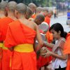 Alms giving in Laos