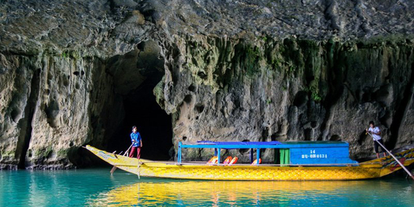 Boat trip along the river to access Phong Nha Cave