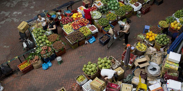 Fruit sellers in a corner of Hom Market