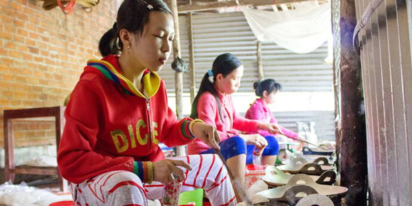 See the local making rice papers at their workshop