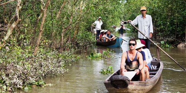 Take a boat trip to discover the waterways of Mekong Delta
