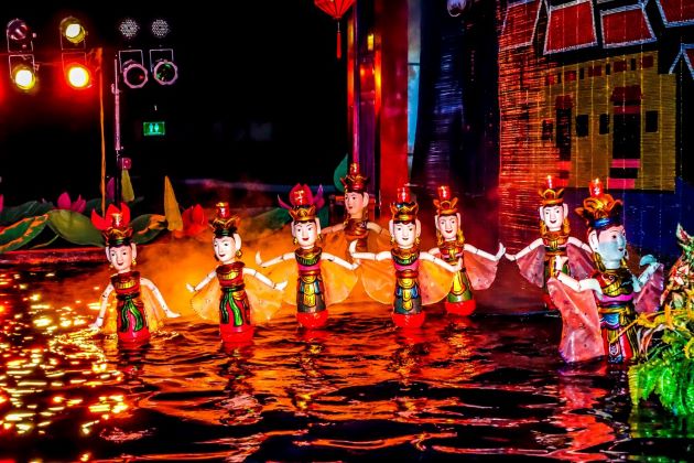 enjoy water puppet show in hanoi