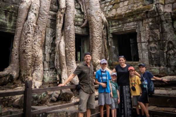 family at Ta Prohm temple - Cambodia tour package
