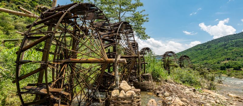 giant wooden wheels in pu luong nature reserve