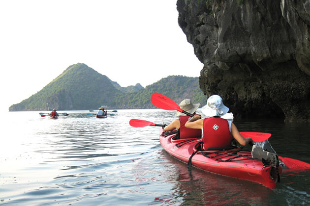 kayaking at halong bay - vietnam tour packages