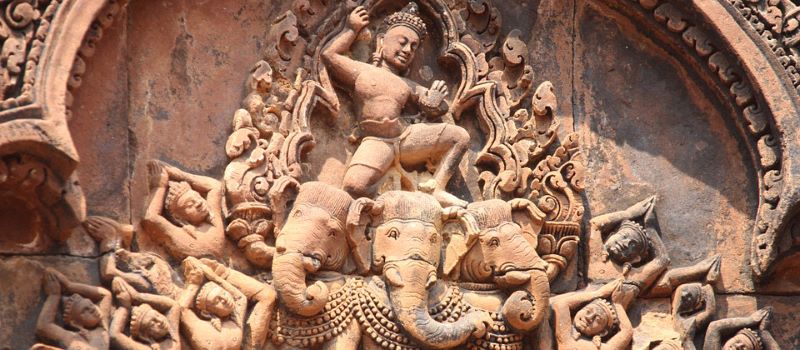 sculpture in angkor wat cambodia and north to south vietnam tour