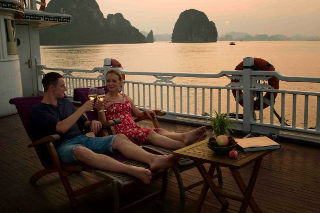 sunset drink in halong bay honeymoon package