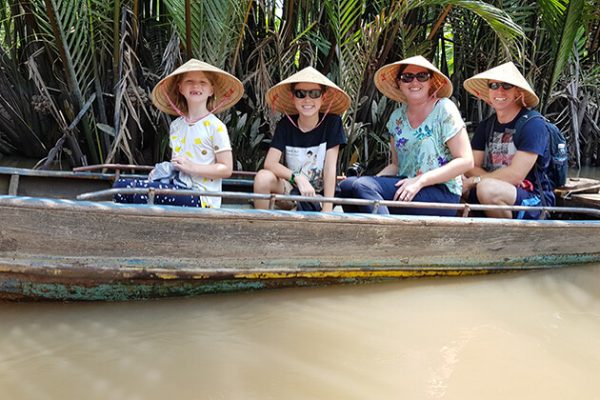 travel through canals at mekong delta with kids