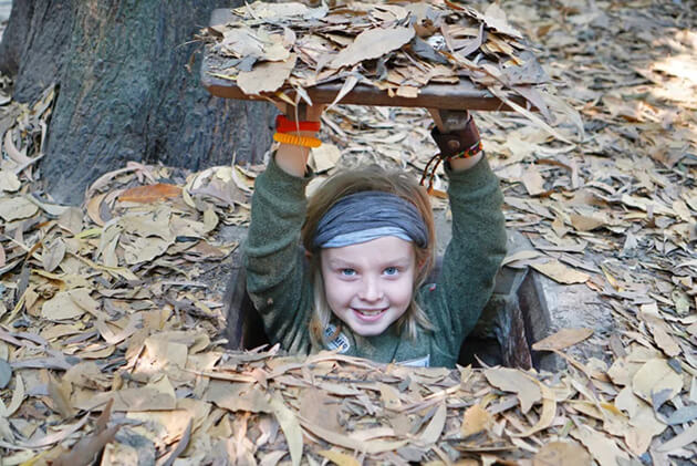 visit cu chi tunnels with the children - Vietnam family tour