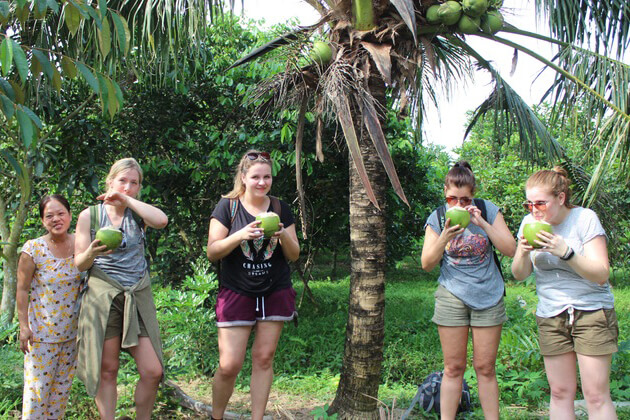 visit local village at mekong delta with family