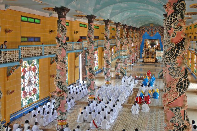 worshipping ceremony in cao dai temple in Tay Ninh