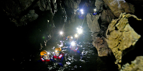 Discover the underground river of Dark cave