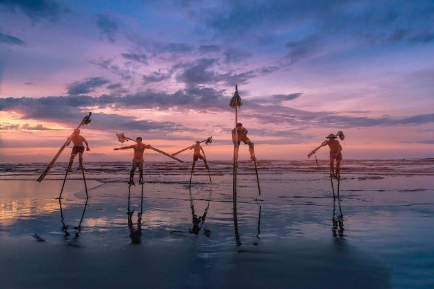 walking on stilts of vietnamese people