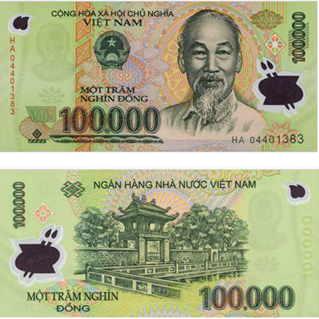 Two sides of the same 100 000 VND vietnam money