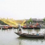 Learn how to cast fishing nets in Cua Dai River