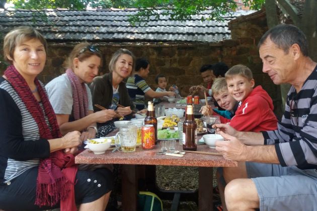 the family enjoys lunch in vietnam