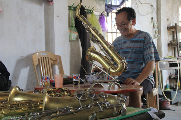 Traditional trumpet making Brass village