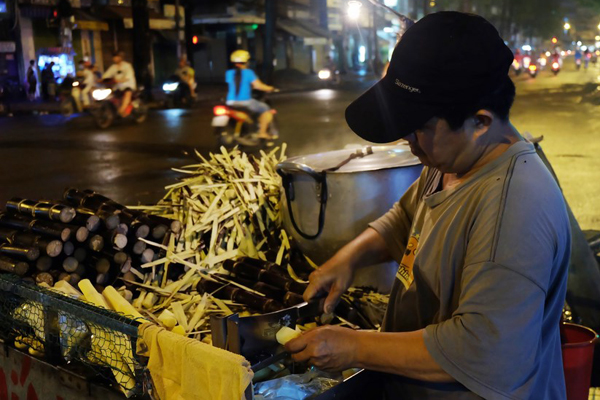 Street vendor in Chinatown, Saigon