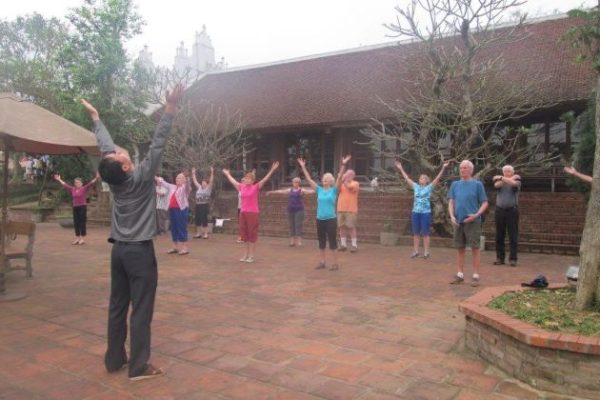 practice Yijinjing traditional exercises in moon garden homestay