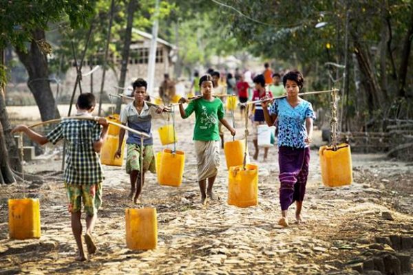 the locals taking water at dala yangon