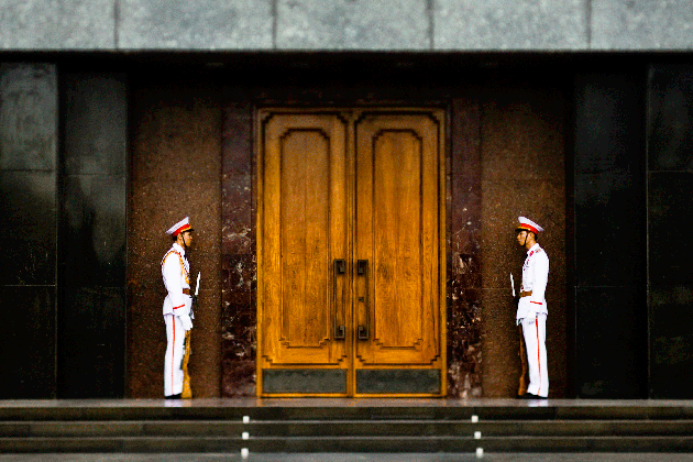 Two entrance guardians in front of the Ho Chi Minh Mausoleum