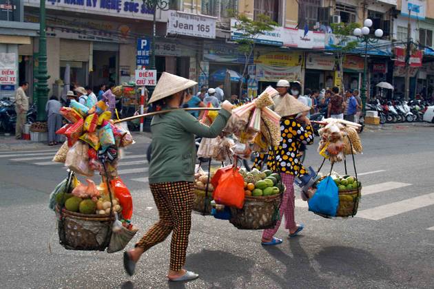 Street vendors in Saigon 19 day vietnam laos cambodia tour