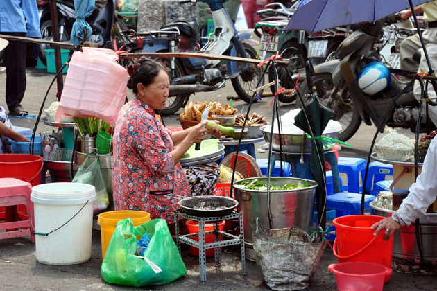 Street vendor in Saigon, vietnam daily life