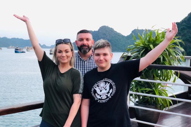 family at halong bay in vietnam