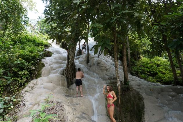 Climbing bua thong waterfalls in chiang mai