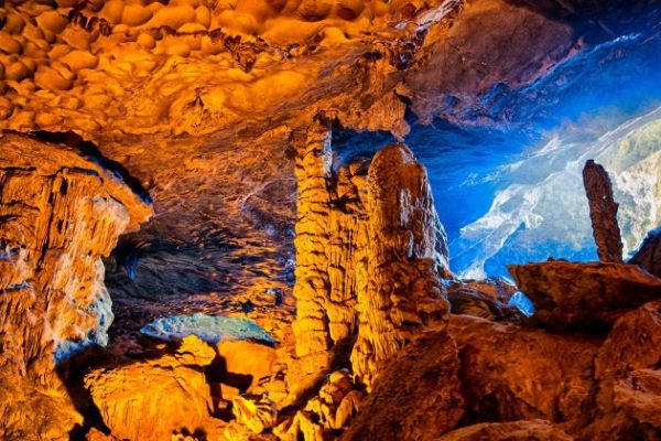 explore cave of surprises in halong bay