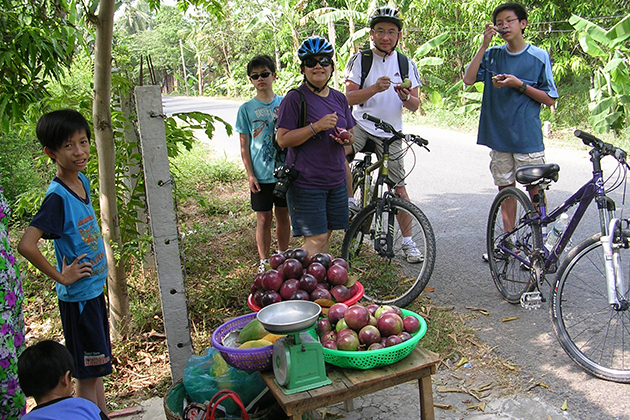 cycling along countryside in vietnam