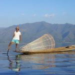leg-rowing fishermen in inle lake myanmar