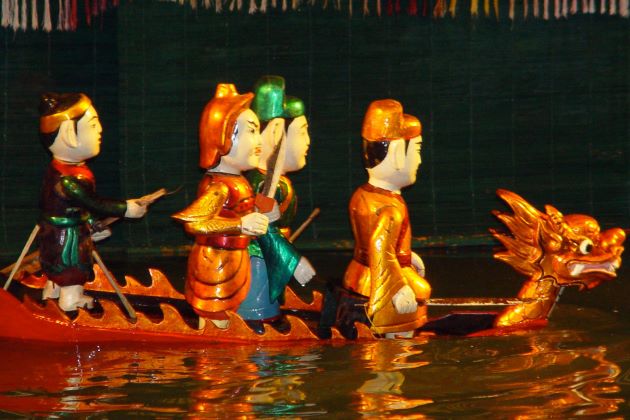 enjoy the water puppet show in hanoi - vietnam vacation