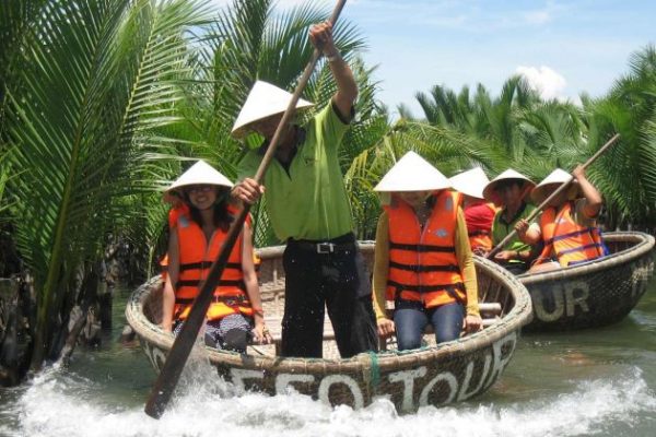 sit on bamboo basket boat in vietnam