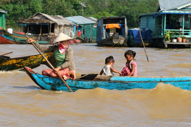 cambodia family travel brings family to floating villages on tonle sap lake