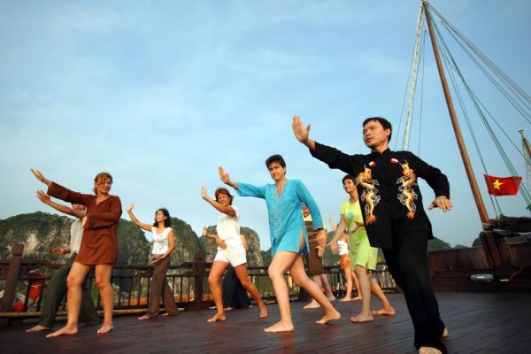 tai chi lesson in the morning at halong bay