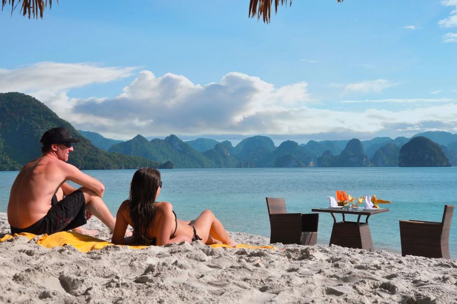 sunbathing in halong bay tours