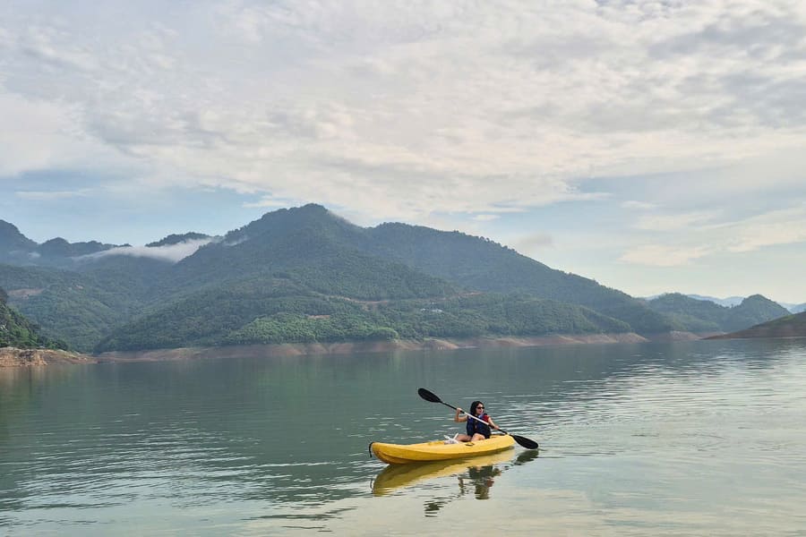 kayaking in mai chau - vietnam day tours